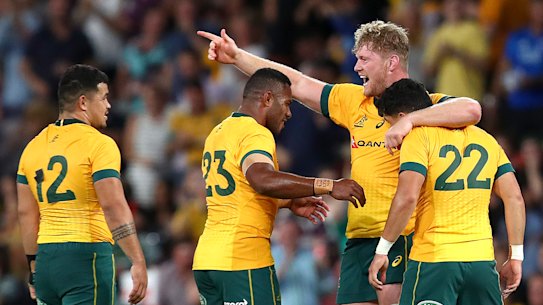 The Wallabies celebrate.