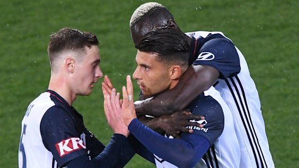 Andrew Nabbout celebrates with Victory teammates after scoring in the FFA Cup.