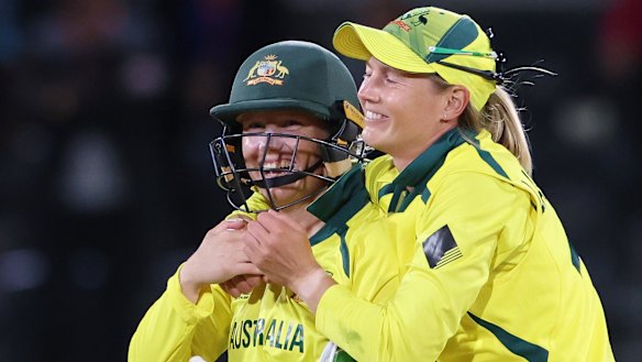 Meg Lanning and Alyssa Healy celebrate World Cup victory in Christchurch.