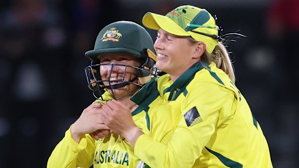 Meg Lanning and Alyssa Healy celebrate World Cup victory in Christchurch.