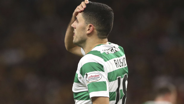 Knocked out: Tom Rogic and Celtic will not feature in the Champions League group stage.