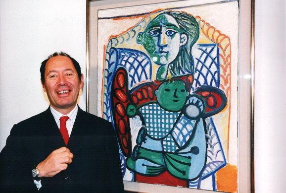 Claude Picasso with a work by his father Pablo “Mother and Child”.