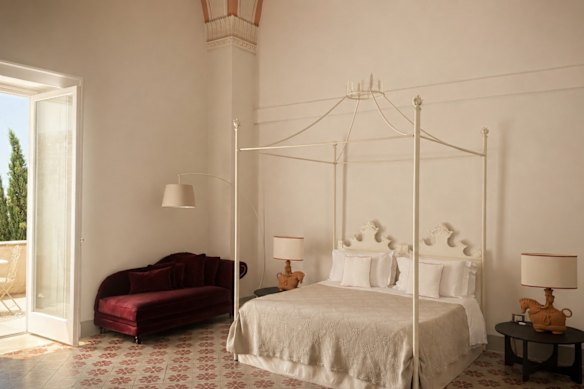 The regal rooms of Relais Monastero Santa Teresa are scattered across two palazzi.