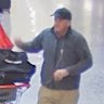 CCTV footage shows an unknown man collecting shoes at Kenmore Village Shopping Centre.