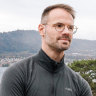 Philip Skiba on the terrace of his rental home in Zollikon, Switzerland, with a view of Lake Zurich.