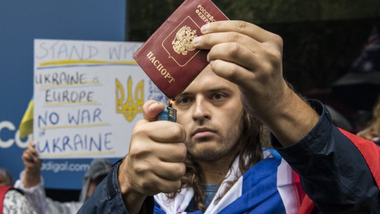 Ilya Fomin at the start of Russia’s invasion of Ukraine this year. He is seen trying to set fire to his Russian passport.
