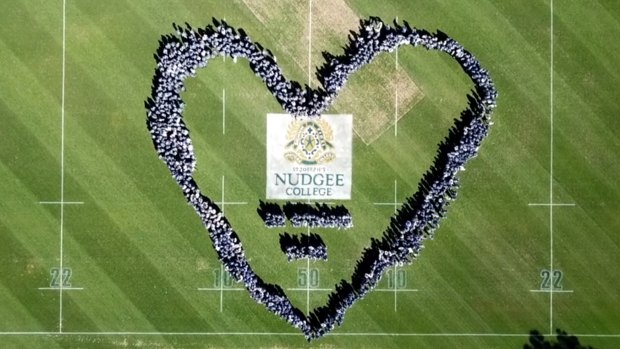 Students from Brisbane's St Joseph's Nudgee College show their support for Alexander Clarke.