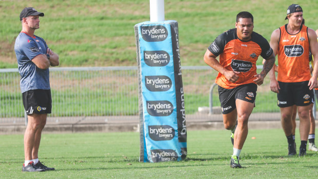 Tigers coach Michael Maguire watches Joey Leilua in his first training session with the side. 