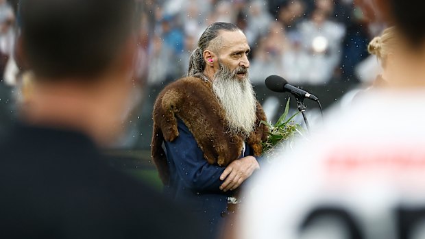 Uncle Colin Hunter delivers the Welcome to Country before the Anzac Day clash between Collingwood and Essendon at the MCG.