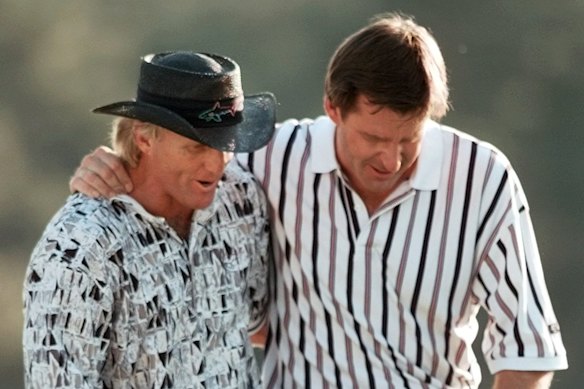 Greg Norman is comforted by Nick Faldo after Faldo won the 1996 Masters.