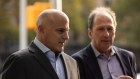 Neil Phillips, left, co-founder and chief investment officer at Glen Point Capital, arrives at court in New York on Tuesday.