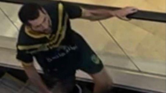 Cauchi on an escalator inside Bondi Junction Westfield.