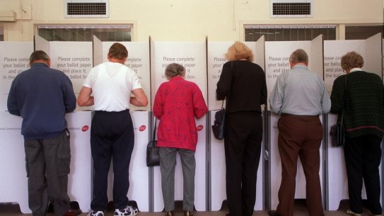 Voters cast their vote
