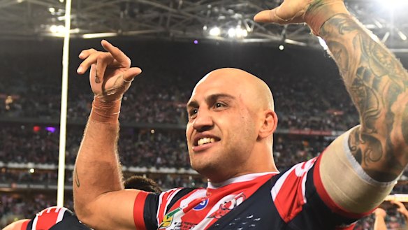 Grand final hero: Blake Ferguson celebrates after the 2018 decider.