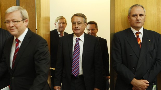 Treasury secretary Ken Henry (right), Prime Minister Kevin Rudd and Treasurer Wayne Swan in 2010. 