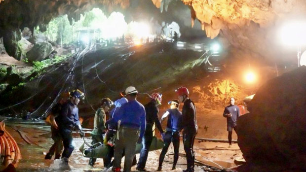 One of the boys is stretchered out of the Tham Luang cave, an expansive cave network that will now be turned into a museum.