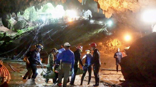 One of the boys is stretchered out of the Tham Luang cave, an expansive cave network that will now be turned into a museum.