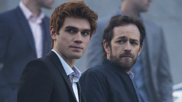 Luke Perry, with Aja Apa (left), as Fred Andrews in Riverdale.