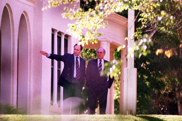 Camping out: Paul Keating shows prime minister-elect John Howard around The Lodge in 1996. Howard decided it wasn’t for him, breaching tradition.
