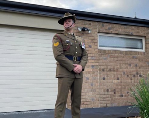 Corey Tomlins in uniform outside his then-home south-east of Melbourne on Anzac Day, 2021.