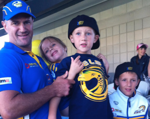 Matt Arthur with his dad Brad in 2011, and brother Jake (right) and sister Charlotte.