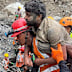 Two workers have been pulled alive from a hydropower tunnel.