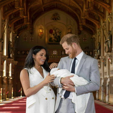 The Duke and Duchess of Sussex with newborn son Archie in St George’s Hall at Windsor Castle.