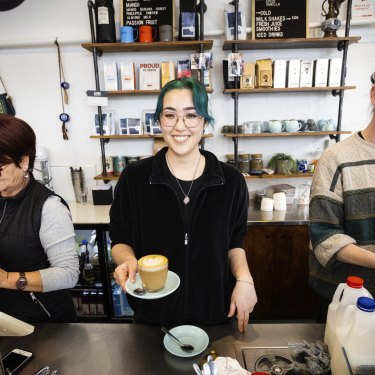 Elisa Mori serves coffee at Moorabbin’s Minnie Miny Mo cafe.