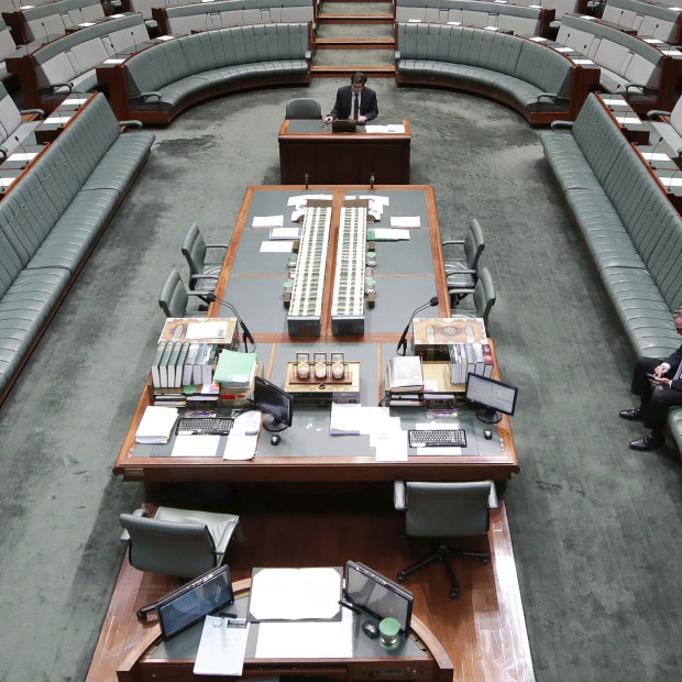 Christopher Pyne on his phone in the House of Representatives on August 23, 2018.