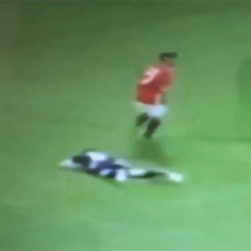 Dean Heffernan was left prone on the turf after copping an elbow to the head from Manchester United 'legend' Keith Gillespie.