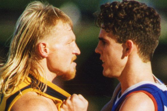Wayne Weidemann gets acquainted with Bulldogs player (and now GWS coach) Leon Cameron in 1994.