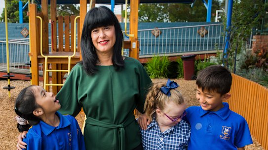 St John's Catholic School principal Kerrie Campagna with Grade 4 students.