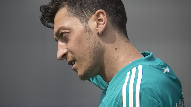 Arsenal manager respects Ozil's Germany choice, says Gunners are his 'home'