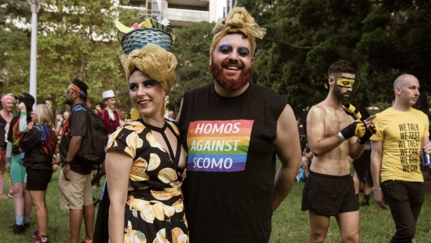 Polly Henry and Julian Olsen among the revellers at the Sydney Gay and Lesbian Mardi Gras.