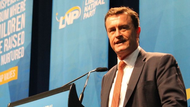 Former LNP president Gary Spence is fighting Labor's property developer donation laws in the High Court.