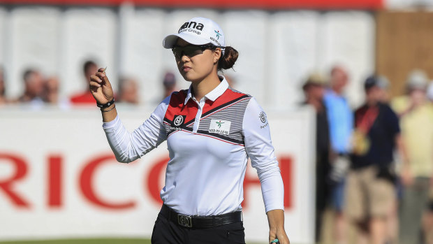 Frontrunner: Australia's Minjee Lee acknowledges the crowd after her opening round.