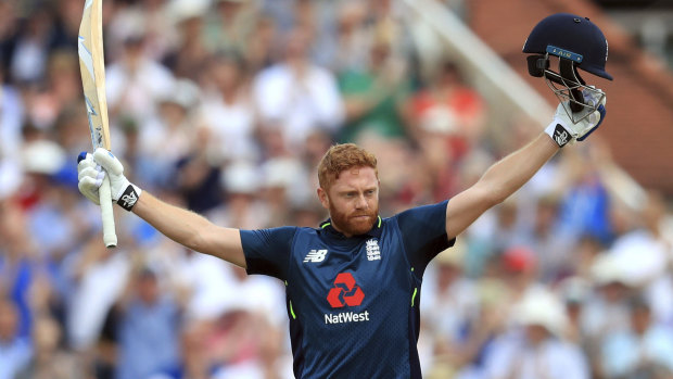 England's Jonny Bairstow celebrates reaching a century  during the one-day international cricket match at Trent Bridge.