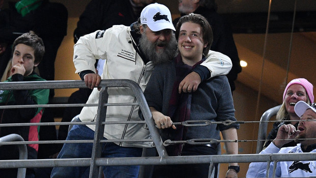 Family passion: Souths co-owner Russell Crowe enjoys the Rabbitohs' comeback with eldest son Charles at ANZ Stadium.