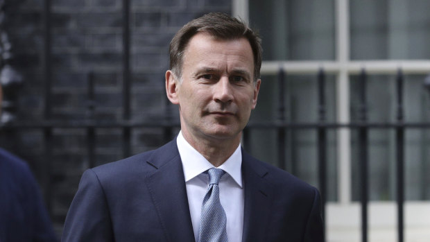 Britain's Foreign Secretary Jeremy Hunt leaves 10 Downing Street, following a meeting held over British oil tanker Stena Impero which was captured by Iran.