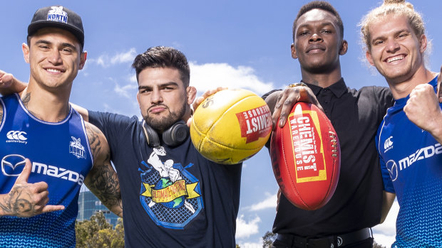 Roos Jed Anderson and Marley Williams gave UFC stars Kelvin Gastelum and Israel Adesnyams some pointers at Arden Street on Tuesday.