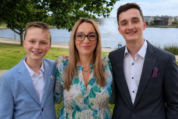 Stella Thomson (centre) and her two sons.
