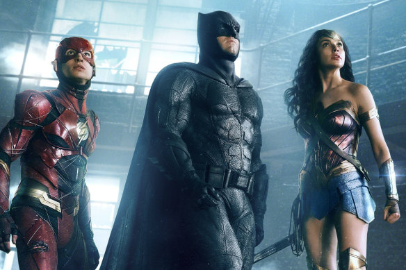 Ben Affleck as Batman in Zack Snyder’s Justice League, with Ezra Miller as The Flash and Gal Gadot as Wonder Woman. 