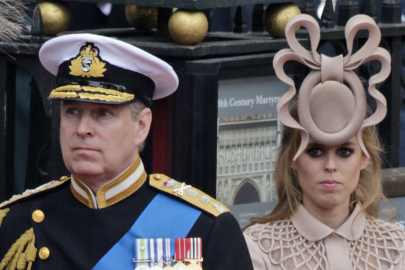Prince Andrew, left, and his daughter Princess Beatrice at the wedding of Prince William and Kate Middleton in 2011.