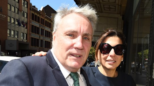 Michael Cranston and his wife Gloria leave the Downing Centre Courts in Sydney on Friday.