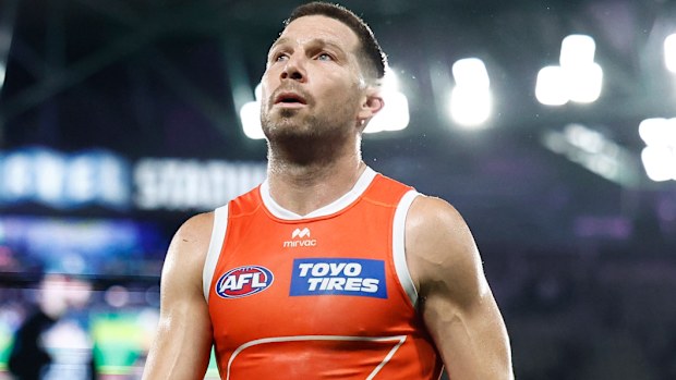 Toby Greene of the Giants leaves the ground with his team.