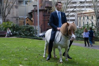 Tom Waterhouse rides his mother's Shetland Pony Brian in his new promotional video.