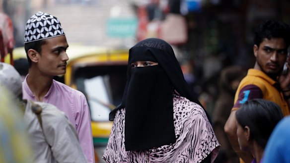 An Indian Muslim woman at a market in New Delhi.