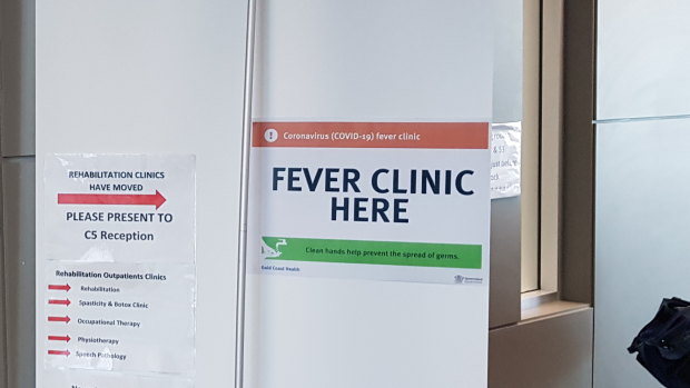 Signage points to the clinic set up at the Gold Coast University Hospital as Queensland ramps up efforts to counter coronavirus.