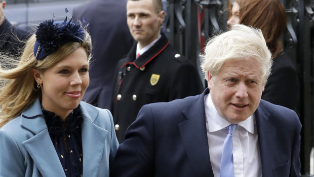 Britain's Prime Minister Boris Johnson and his partner Carrie Symonds arriving at Westminster Abbey in March.