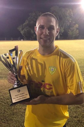 Andy Jones with the 2019 pre-season cup his team won.